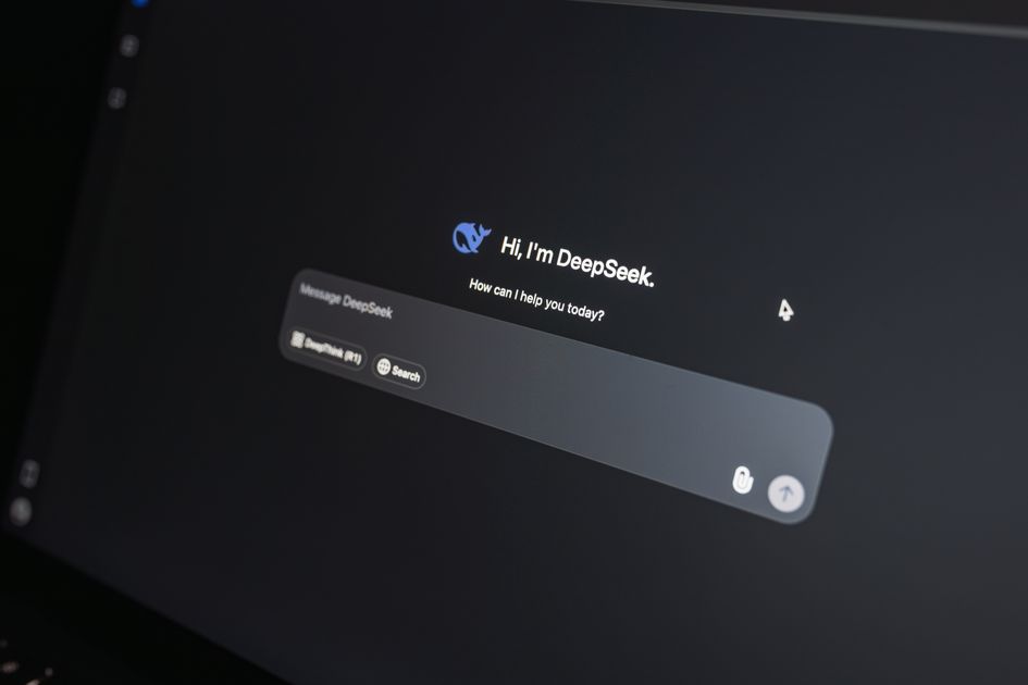 A deepseek AI chat interface glowing on a laptop screen in low light