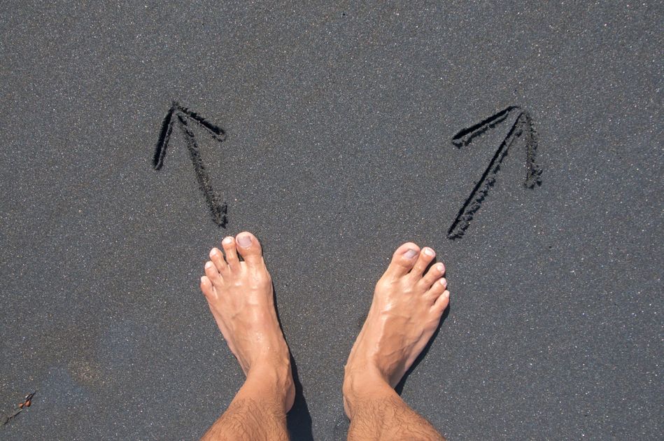 A decision point with two paths marked by soft lighting