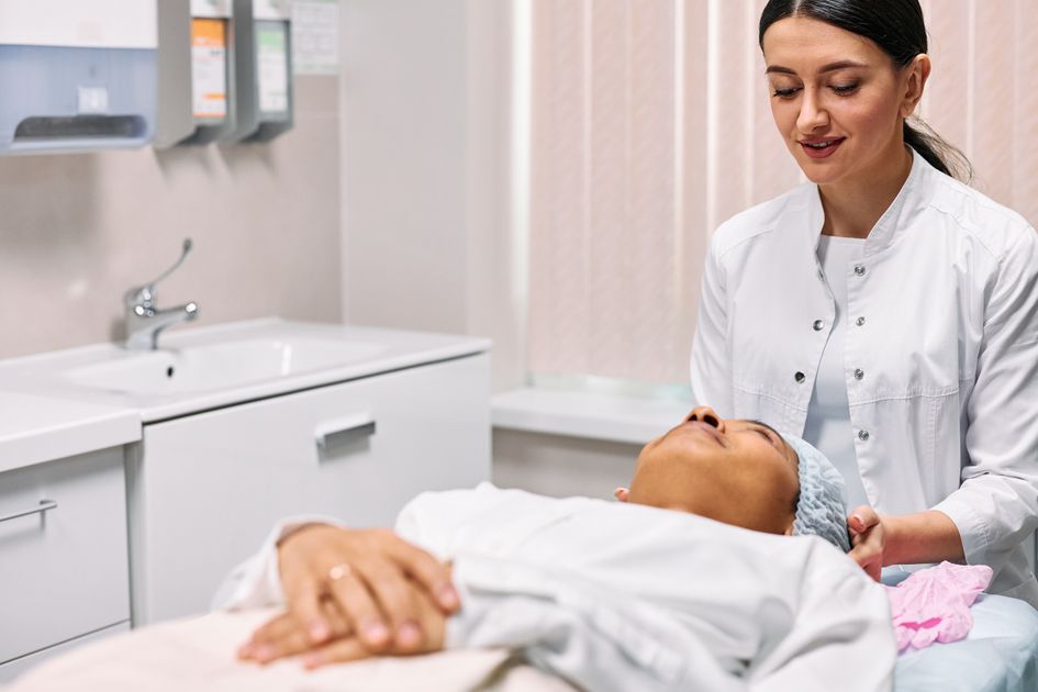 A beautician providing a calm skincare treatment