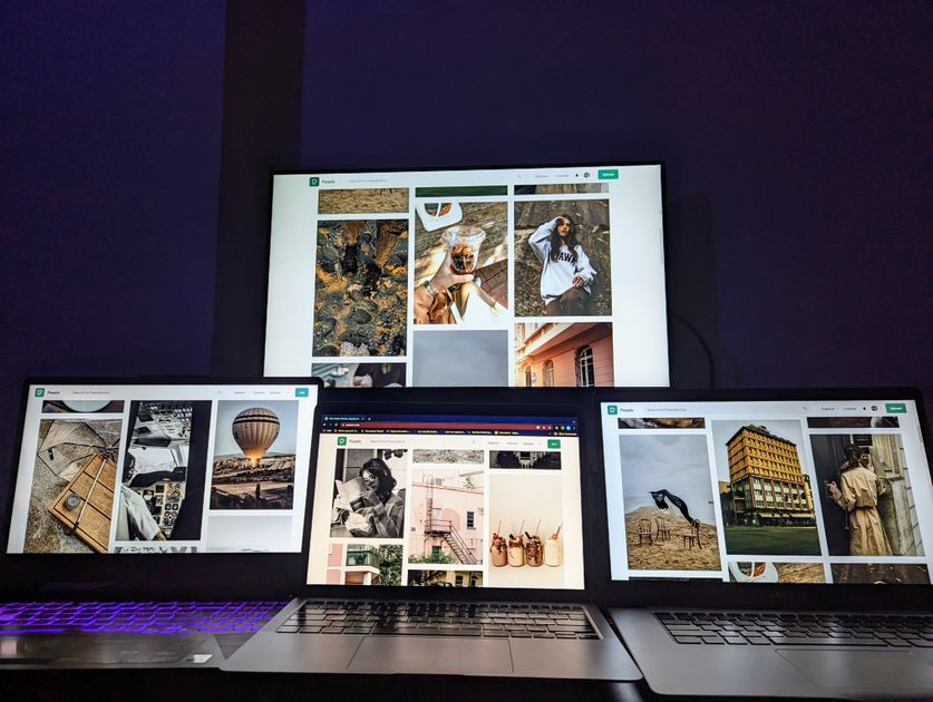 A modern digital setup with multiple screens showing organized content