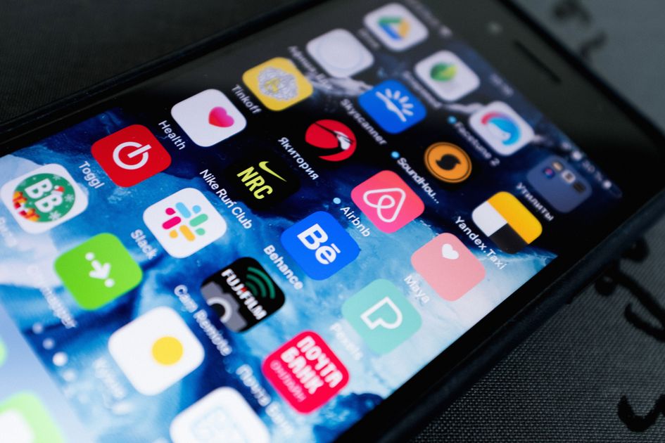 A smartphone displaying multiple app icons on screen
