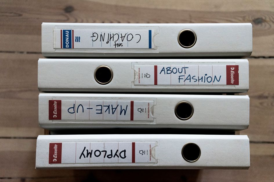 Ring binders with stickers and written titles