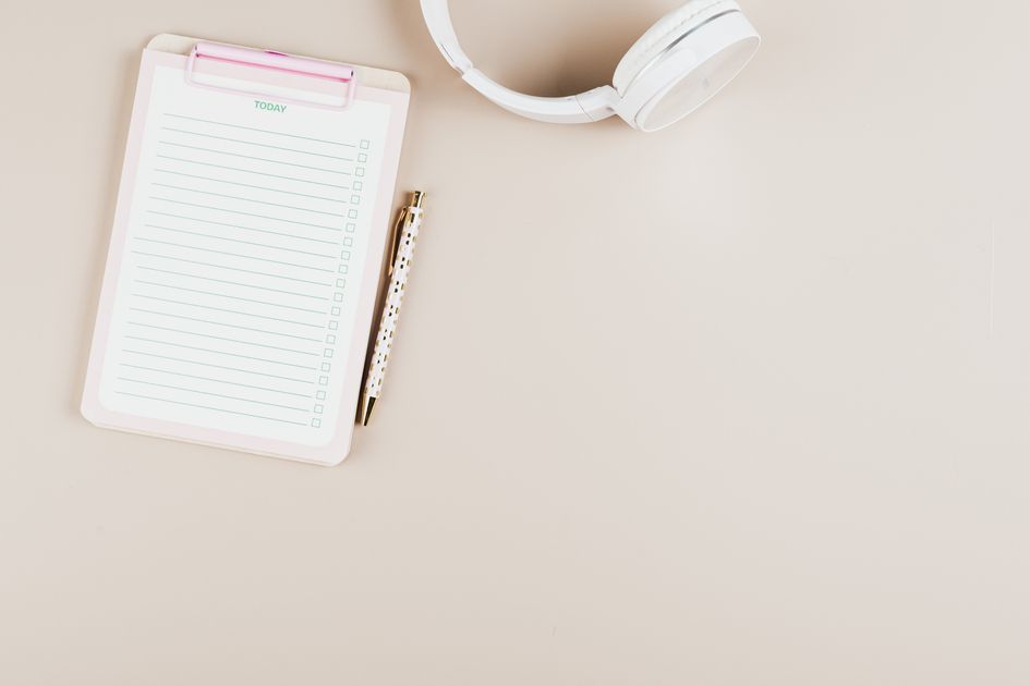A simple flat lay of a notepad and pen