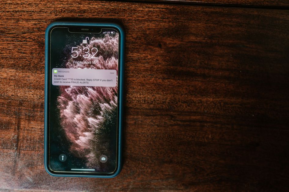 A smartphone on a table displaying a missed alert