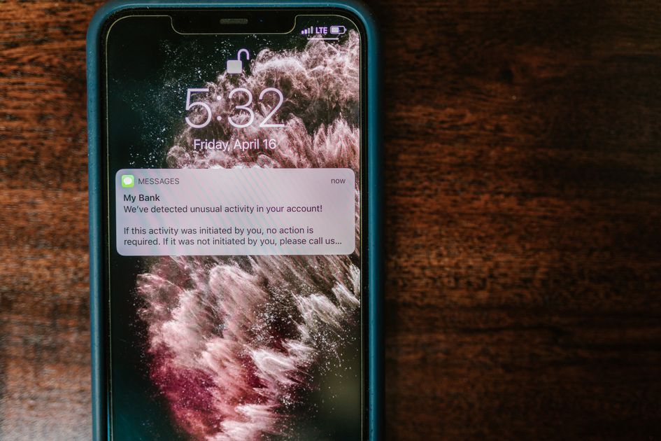 A smartphone on a table showing a missed notification