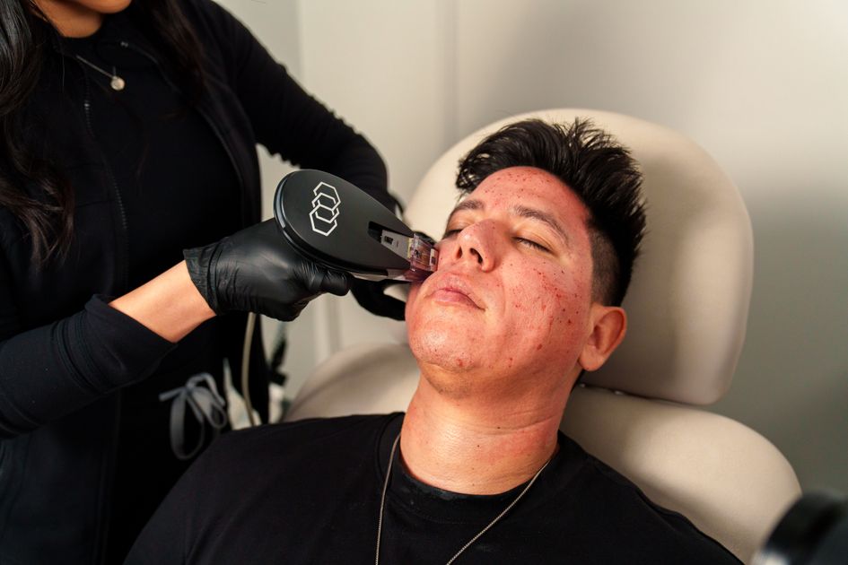A client receiving a facial treatment in a med spa