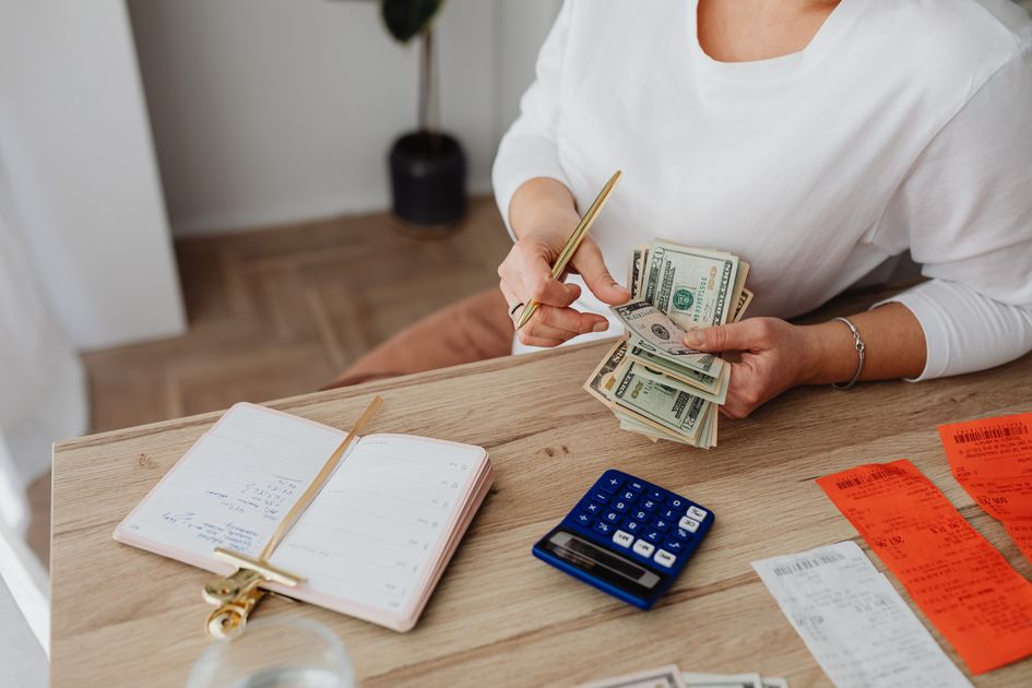 Two businesswomen analyzing financial projections